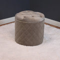 Round Velvet Ottoman with Button Tufting and Chrome Nailheads